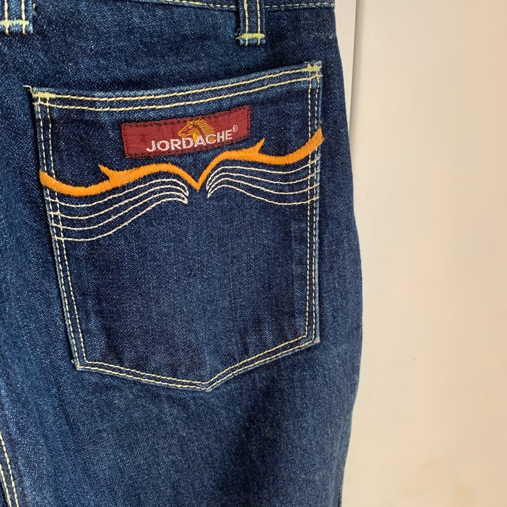 Vintage Jordache high waisted, dark blue jeans.